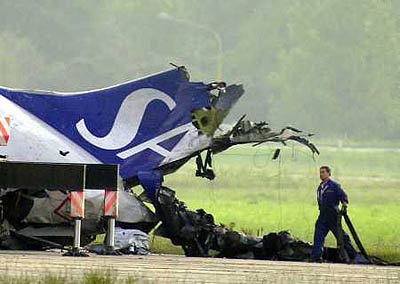 Photos of the Scandinavian Airlines (SAS) MD-87 crash