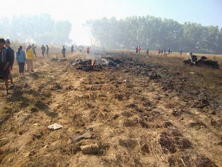 Photos of the Air Bagan Fokker F-100 crash