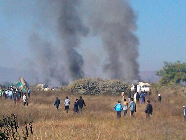 Photos of the Air Bagan Fokker F-100 crash