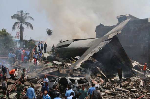 Photos of the Indonesian Air Force Hercules C-130B crash