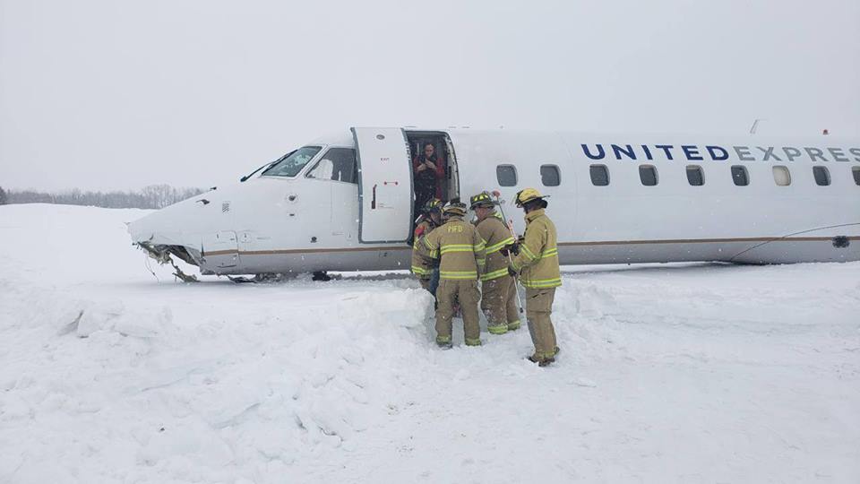 Photos of the United Express Embraer 145XR crash