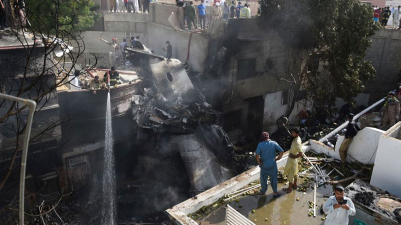 Photos of the Pakistan International Airlines Airbus A320 crash