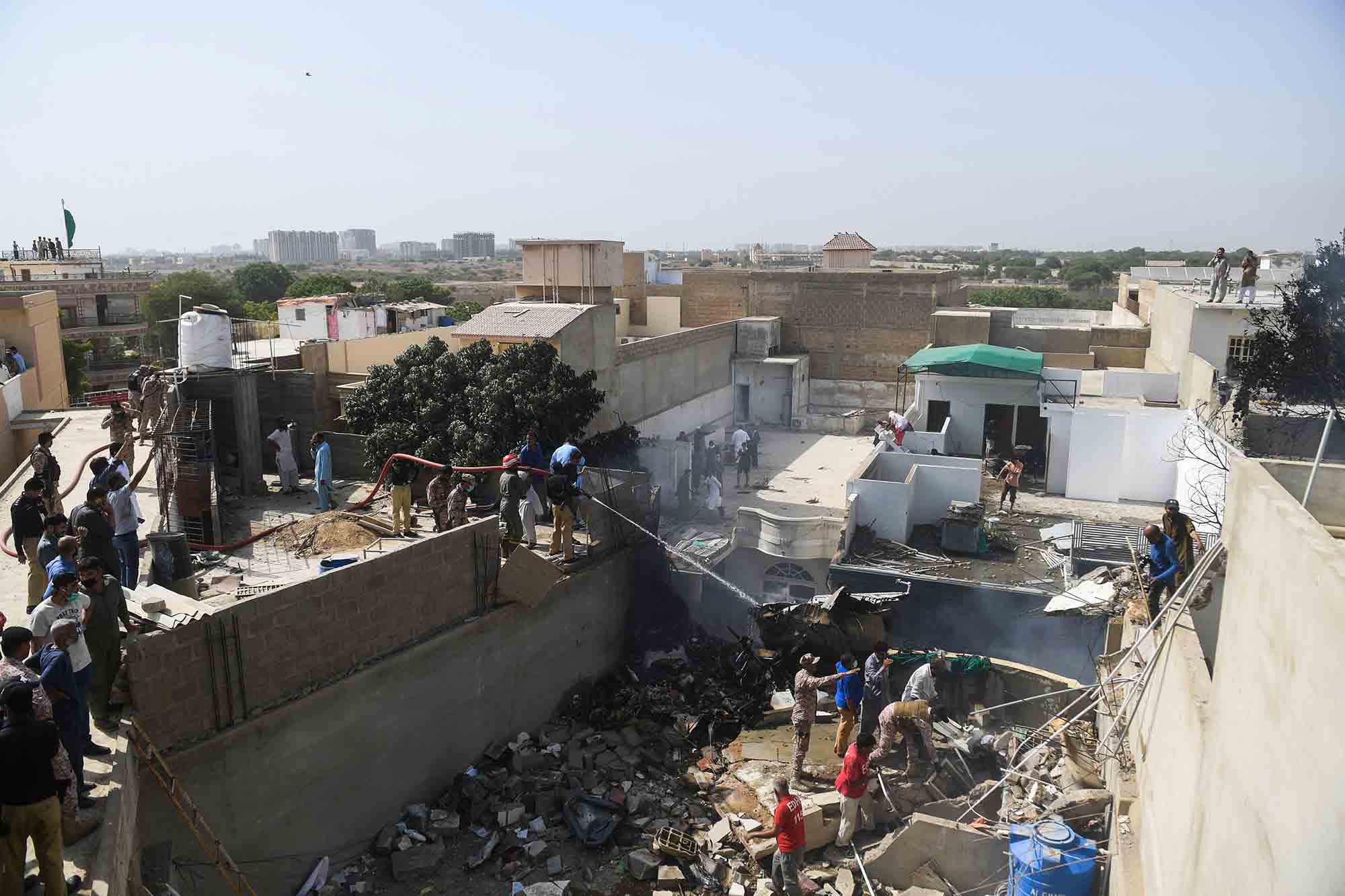Photos of the Pakistan International Airlines Airbus A320 crash