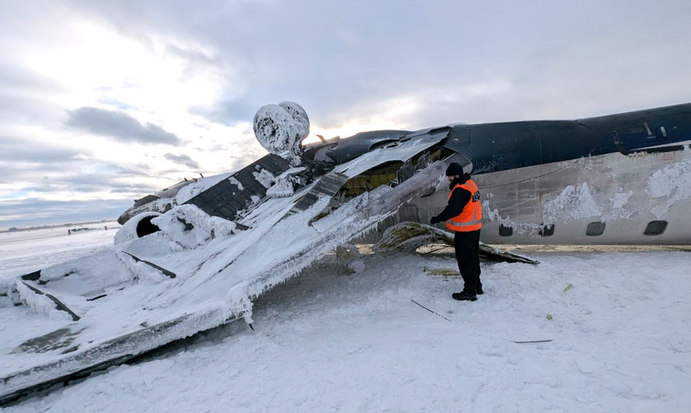 Photos of the Delta Connection Canadair CRJ-900LR crash