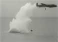 Dropping a bouncing bomb, being hit by the water spray