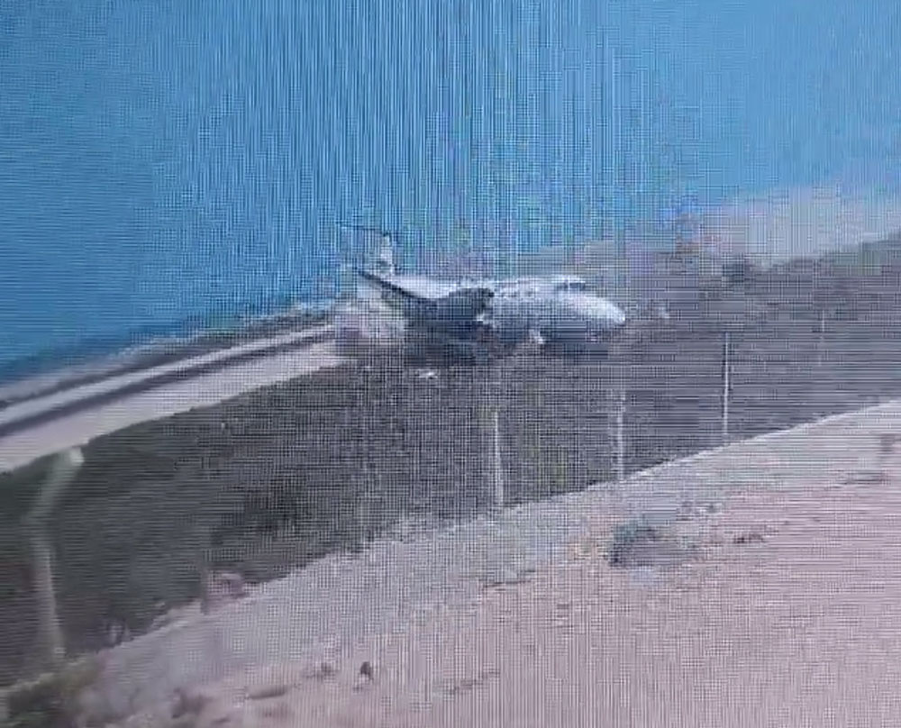 Landing gear collapses on landing: Embraer EMB-120 veers off runway and hits fence