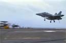 The F18 hornet lands on a carrier, but the arresting cable snaps