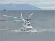 The rotor hits the water, the MI-14 helicopter breaks up