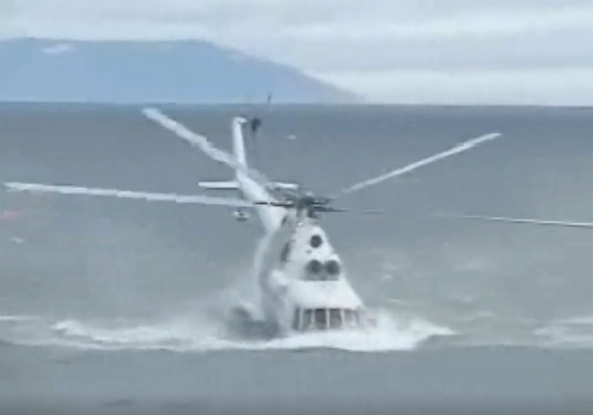 The rotor hits the water, the MI-14 helicopter breaks up