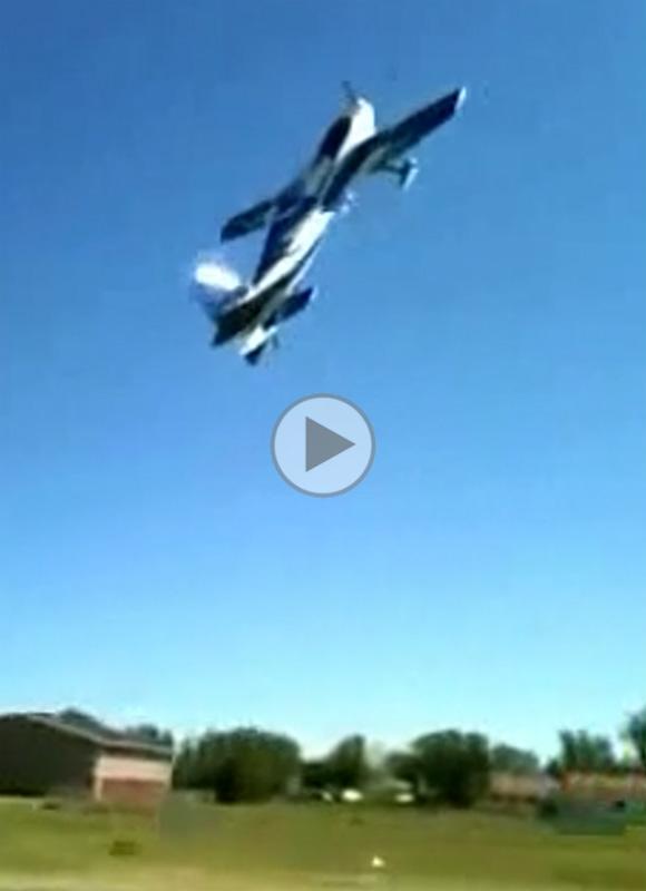 Midair collision between a biplane and a large-scale radio-controlled model