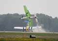 P-51 Mustang collided with another P-51 as they were both landing at Oshkosh air show