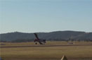 Right wing stalls during very low speed landing